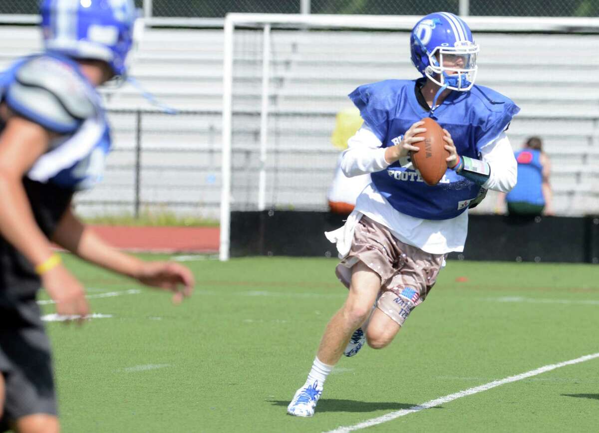 Darien quarterback Tim Graham during football practice Wednesday, Sept. 3, 2014, at Darien High School.