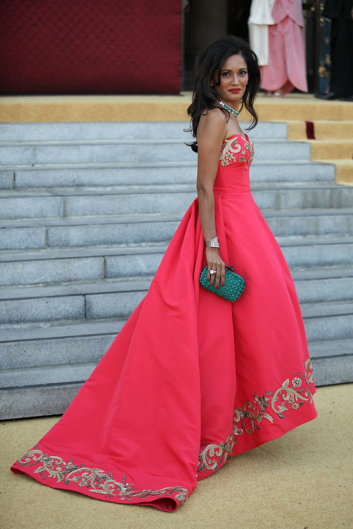 Komal Shah poses in an Oscar de la Renta gown after arriving at the San Francisco Opera's season opening ball in San Francisco Calif. on Friday, Sept. 5, 2014.