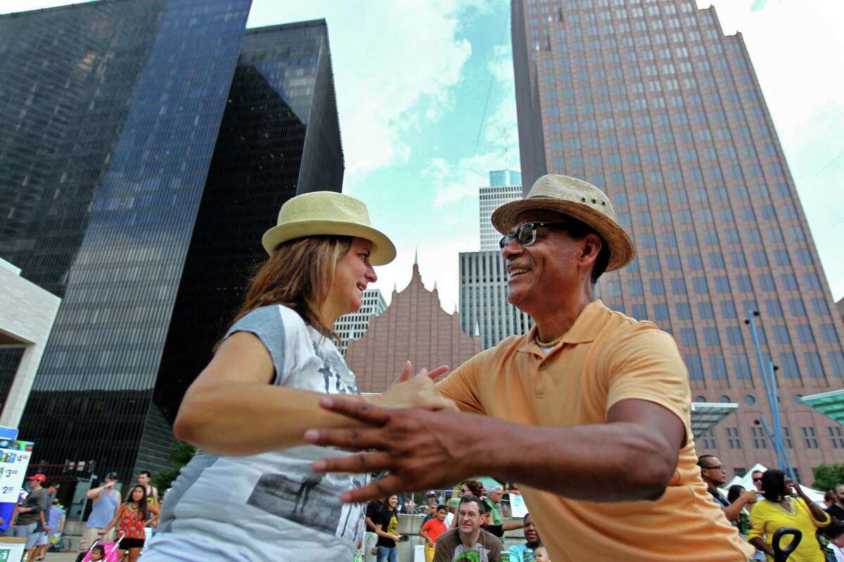 Gloria Costa and Manuel Vasquez, of Houston, dance to the music of Choro Ao Ponto at the Houston Brazilian Festival, sponsored by the Brazilian Arts Foundation, at Jones Plaza Saturday, Sept. 6, 2014, in Houston, Texas. The event featured live music, performances, food and more.
