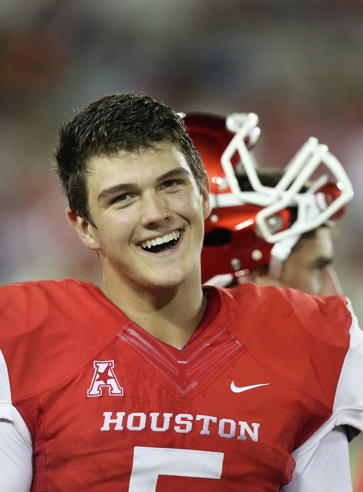 Houston Cougars quarterback John O'Korn (5) smiles after watching the second string score against the Grambling State Tigers in the second half on September 6, 2014 at John O'Quinn Field at TDECU Stadium in Houston, TX. (Photo: Thomas B. Shea/For the Chronicle)