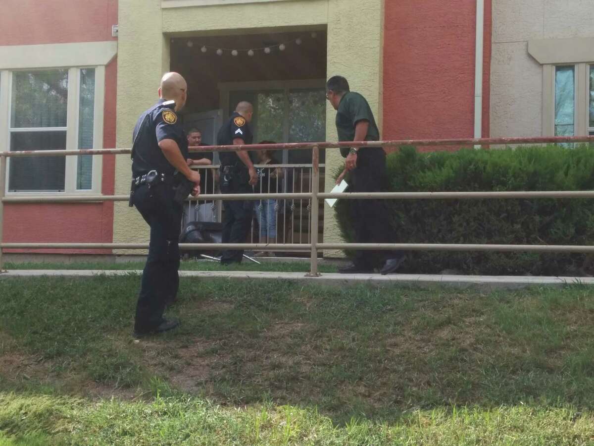 SAPD officers investigate the scene of a shooting Sunday afternoon around the Costa Mirada apartment complex in the 9000 block of Somerset Road.