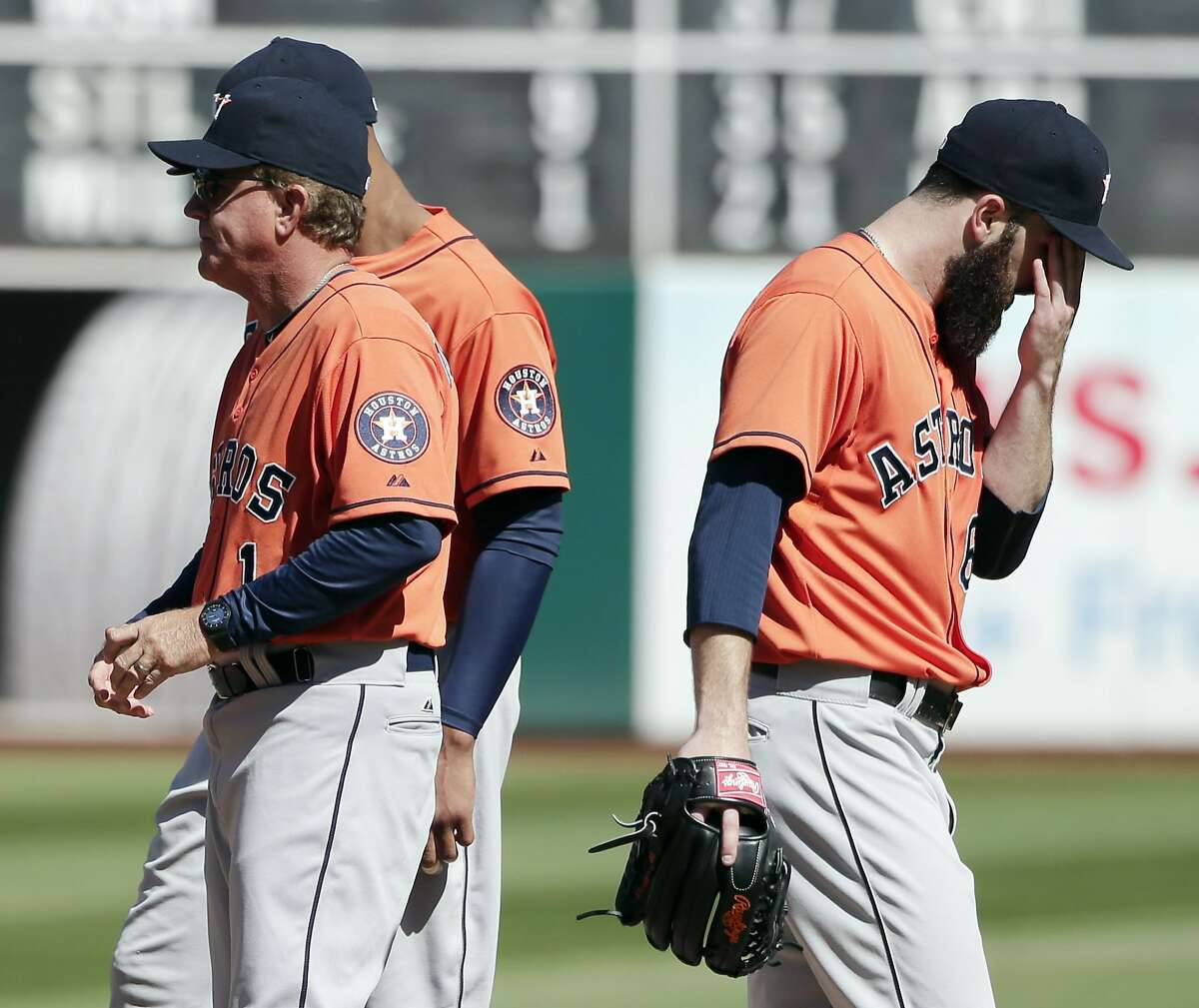 Houston Astros' L.J. Hoes, right, celebrates after his solo home