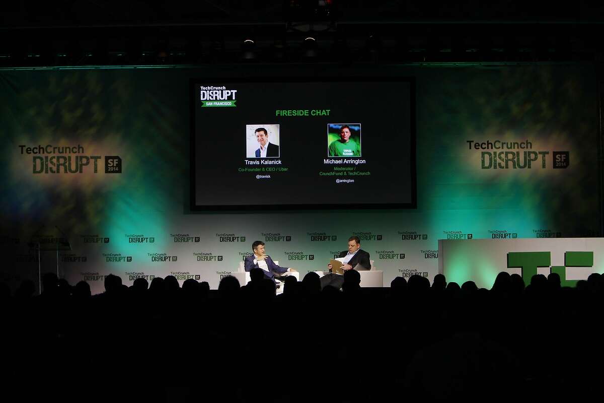Travis Kalanick (l to r), Uber co-founder and CEO and Michael Arrington TechCrunch founder talk during a fireside chat at TechCrunch Disrupt SF on Monday, September 8, 2014 in San Francisco, Calif.