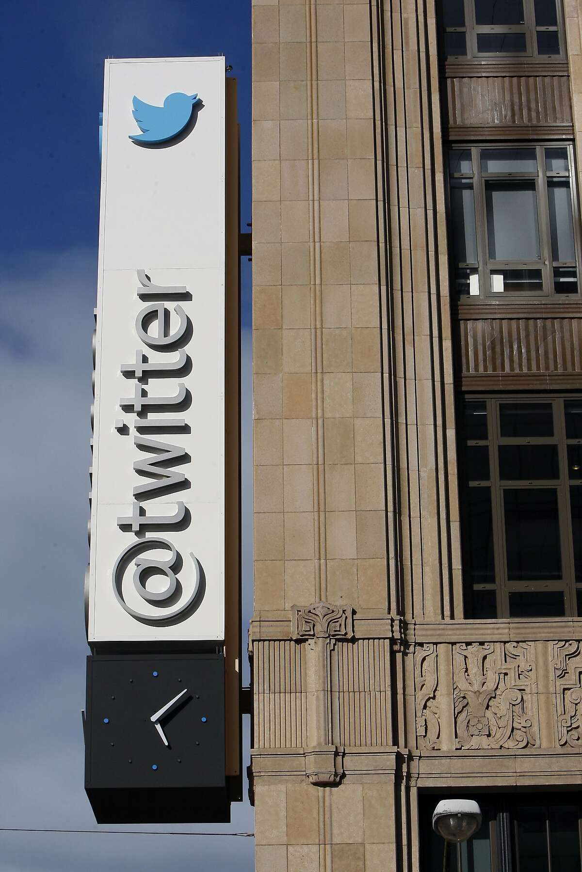 Twitter's sign hangs on the front of the its building that was the old Western Furniture Exchange and Merchandise Mart on Market Street on April 25, 2014 in San Francisco, Calif. Tech companies are buying historic buildings within the city thus helping to protect these landmarks.