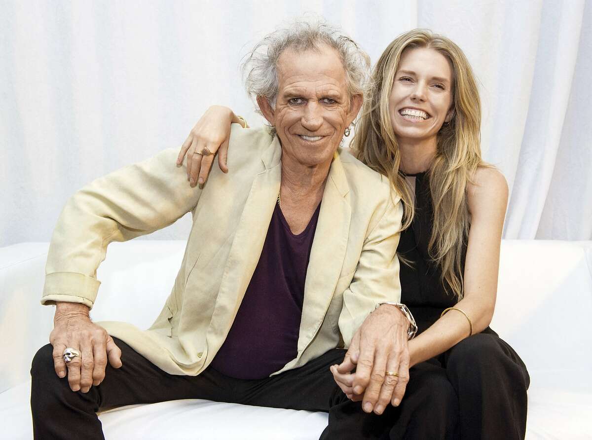 This undated image released by Mindless Records shows Keith Richards, of The Rolling Stones, left, with his daughter Theodora Richards. "Gus & Me: The Story of My Granddad and My First Guitar," by Keith Richards and art by Theodora Richards. The book will be released on Sept. 9, 2014. (AP Photo/Mindless Records, Brian Rasic)