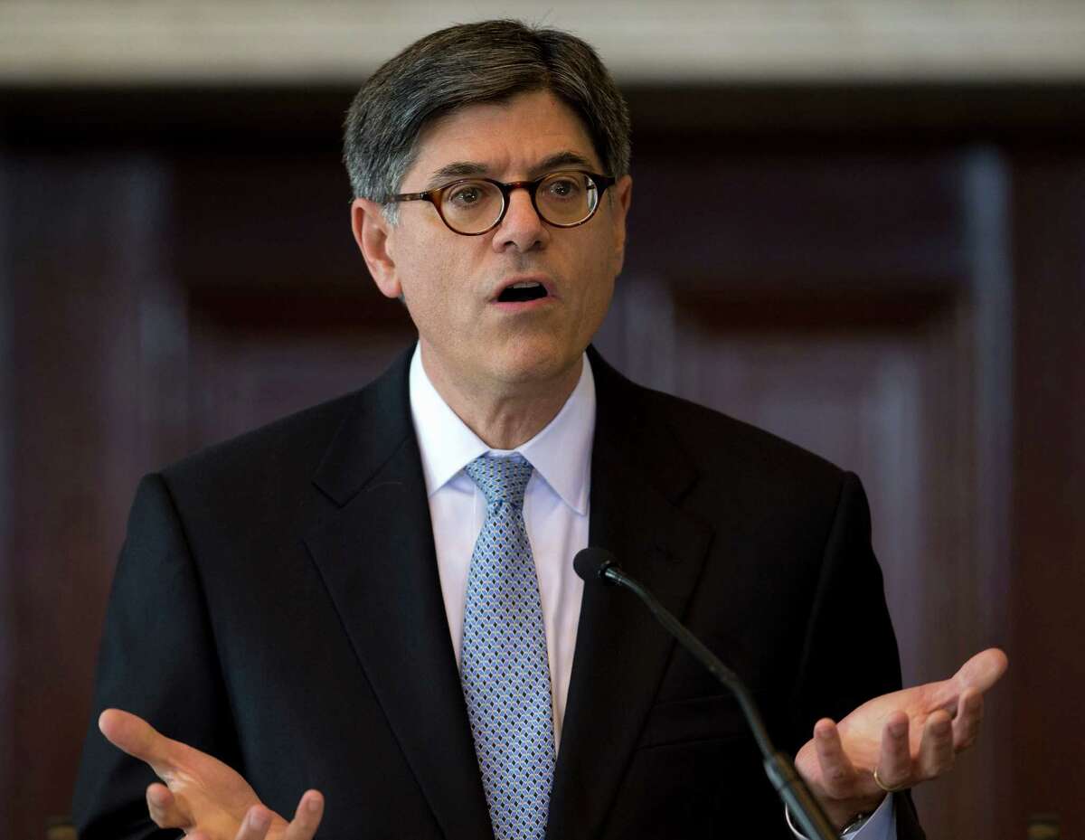 FILE - In this Sept. 4, 2014 file photo, Treasury Secretary Jacob Lew speaks in the Cash Room of the Treasury Department in Washington. The Obama administration will decide "in the very near future" what actions it can take to make it less profitable for U.S. companies to shift their legal addresses to other countries, Lew said Monday. A growing number of U.S. companies are shifting their addresses abroad in an effort to reduce their U.S. taxes. The maneuver is known as a corporate inversion. (AP Photo/Carolyn Kaster, File)