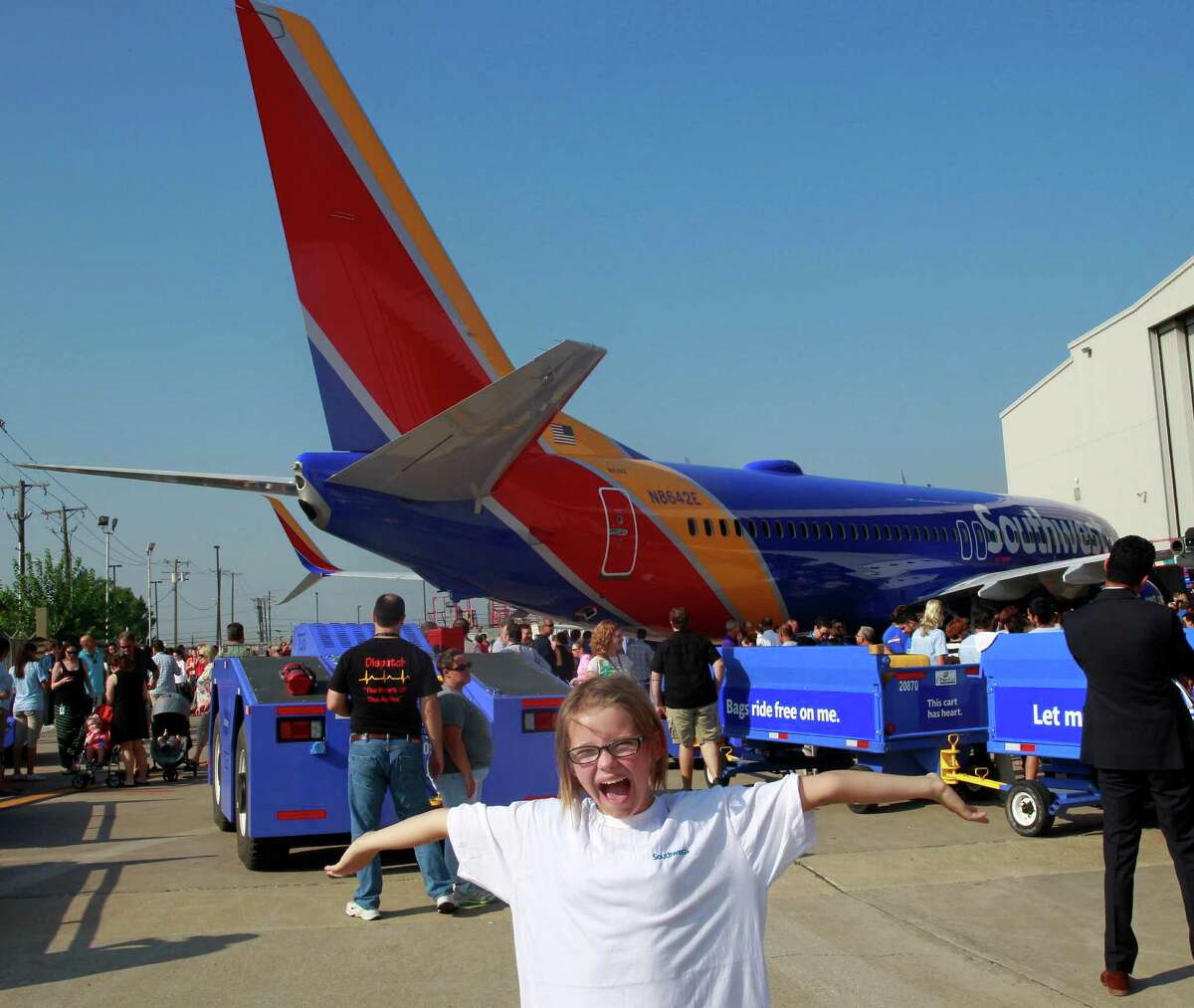 Indigo Pyles, 10, strikes a pose﻿ during an event Monday in Dallas unveiling a new color scheme for Southwest Airlines jets. The airline has a major presence at Houston's Hobby Airport.﻿