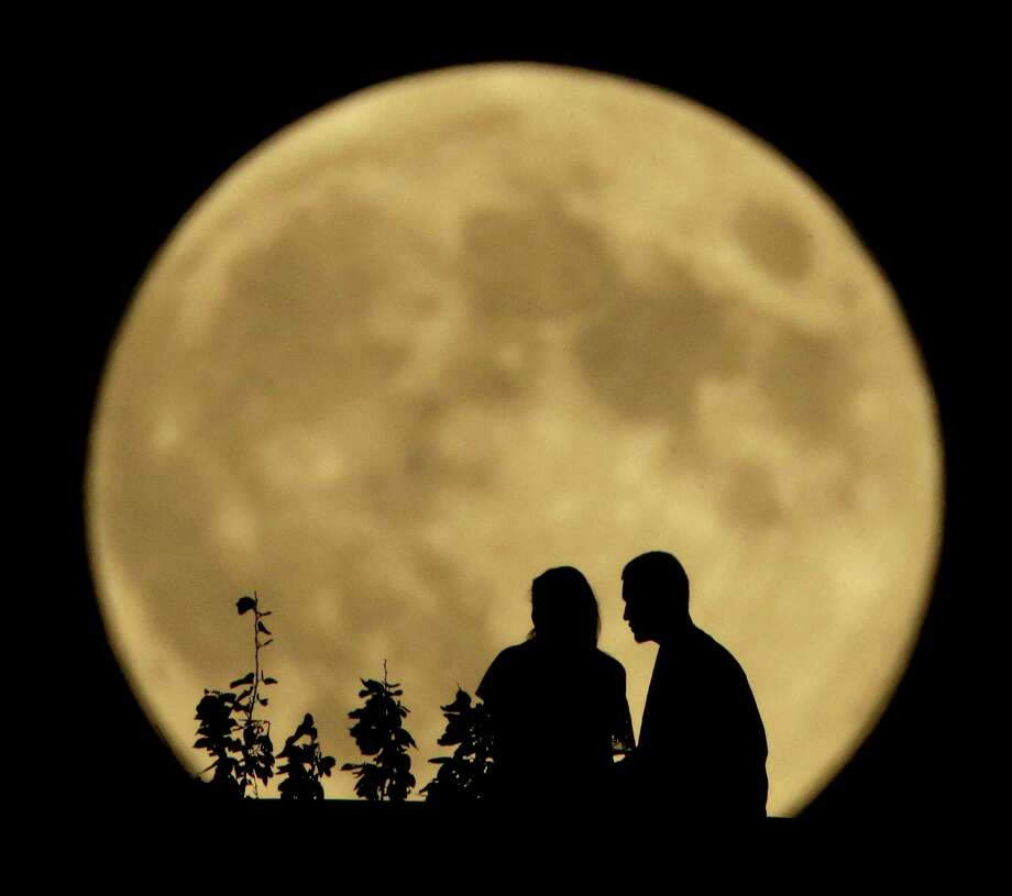 Photos Harvest moon glows in the sky Times Union
