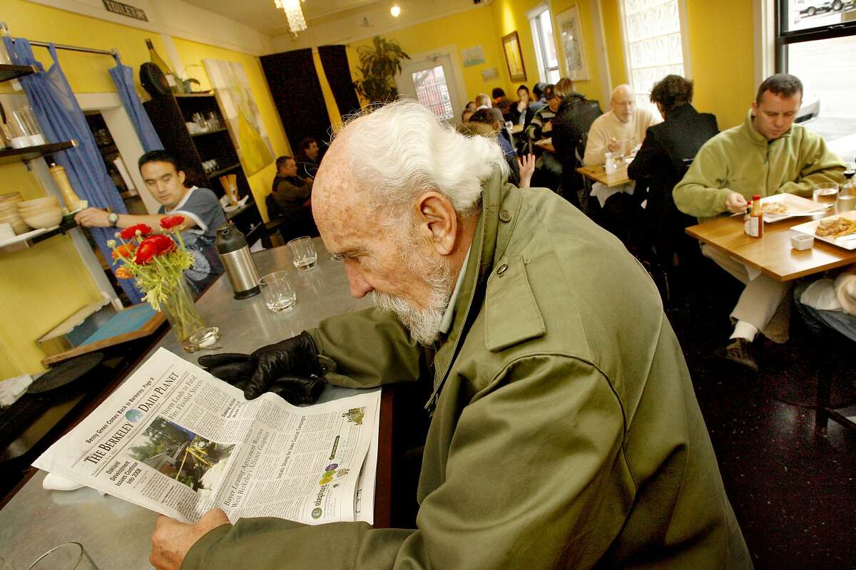 The name of the restaurant is the same as the address of the restaurant: 900 Grayson. Ron Penndorf, a regular, reads The Berkeley Daily Planet at the counter. These pictures were made in Berkeley, CA. on Tuesday, Jan. 8, 2008.