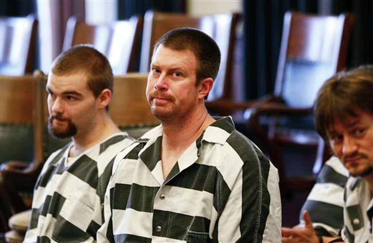 FILE - In this May 8, 2012, file photo, former NFL quarterback Ryan Leaf, center, sits in a Cascade County courtroom in Great Falls, Mont. Leaf has been sentenced to five years in prison in Texas for violating terms of his probation. (AP Photo/The Great Falls Tribune, Larry Beckner, File) NO SALES