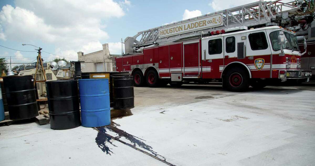 Chemicals leak from barrels Tuesday at the City of Houston Fire Department Logistical Center and Maintenance Depot at 1205 Dart. A recent inspection echoed many of the same problems cited three years ago fire inspector report.