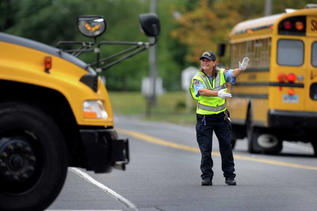 Dancing traffic guard spreads the joy