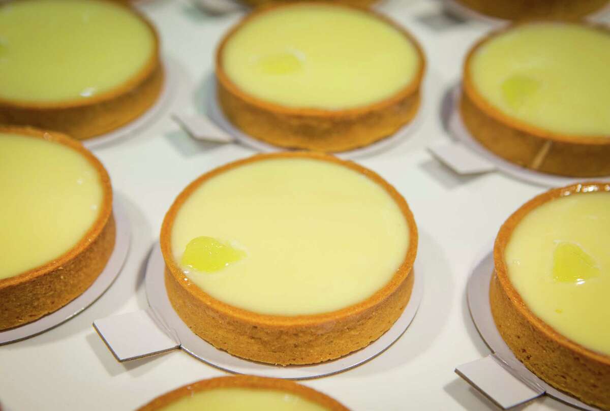 FOR CHRON 100 RESTAURANT REVIEW. DO NOT USE FOR ANYTHING ELSE WITHOUT A PHOTO EDITOR'S PERMISSION. THANKS. Common Bond Cafe & Bakery's lemon tarts, photographed, Friday, July 18, 2014, in Houston. ( Nick de la Torre )
