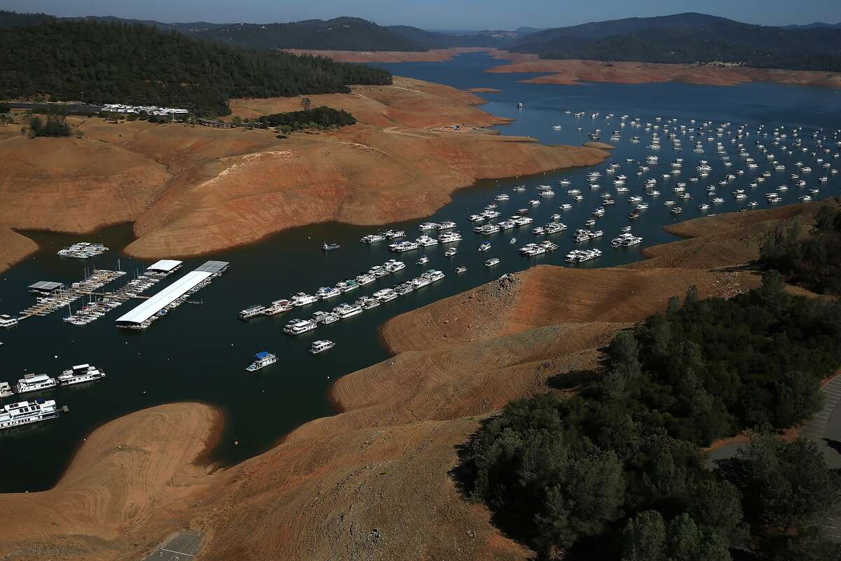 Here, Lake Oroville is nearly dry on Aug. 19, 2014. As the severe drought in California continues for a third straight year, water levels in the state's lakes and reservoirs are reaching historic lows. Lake Oroville was at 32 percent of its total 3,537,577 acre feet in August. (Photo by Justin Sullivan/Getty Images.)