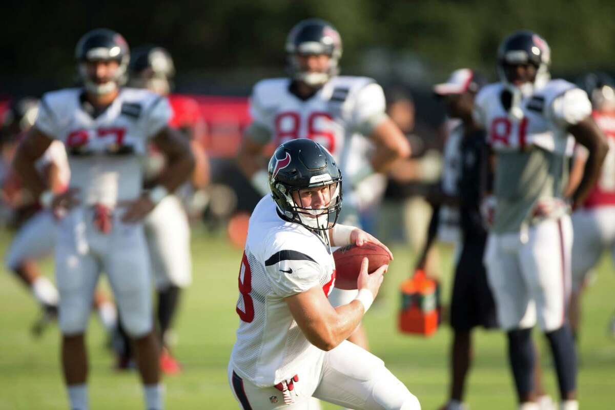 Houston Texans tight end Garrett Graham (88) runs with the football after making a catch during Texans training camp at the Methodist Training Center Wednesday, Aug. 13, 2014, in Houston. ( Brett Coomer / Houston Chronicle )