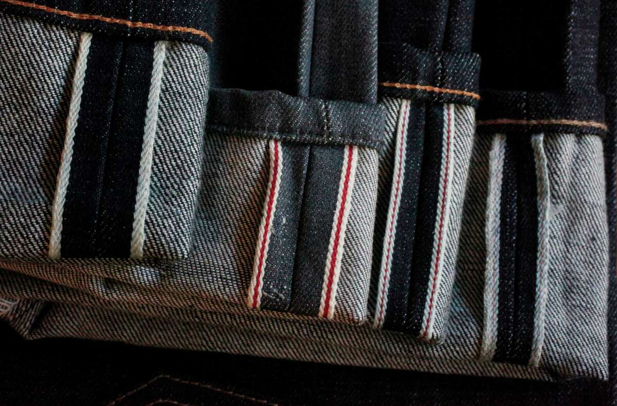 Selvage stripes indicate different denim mills on jeans at Two Jacks Denim in Oakland.