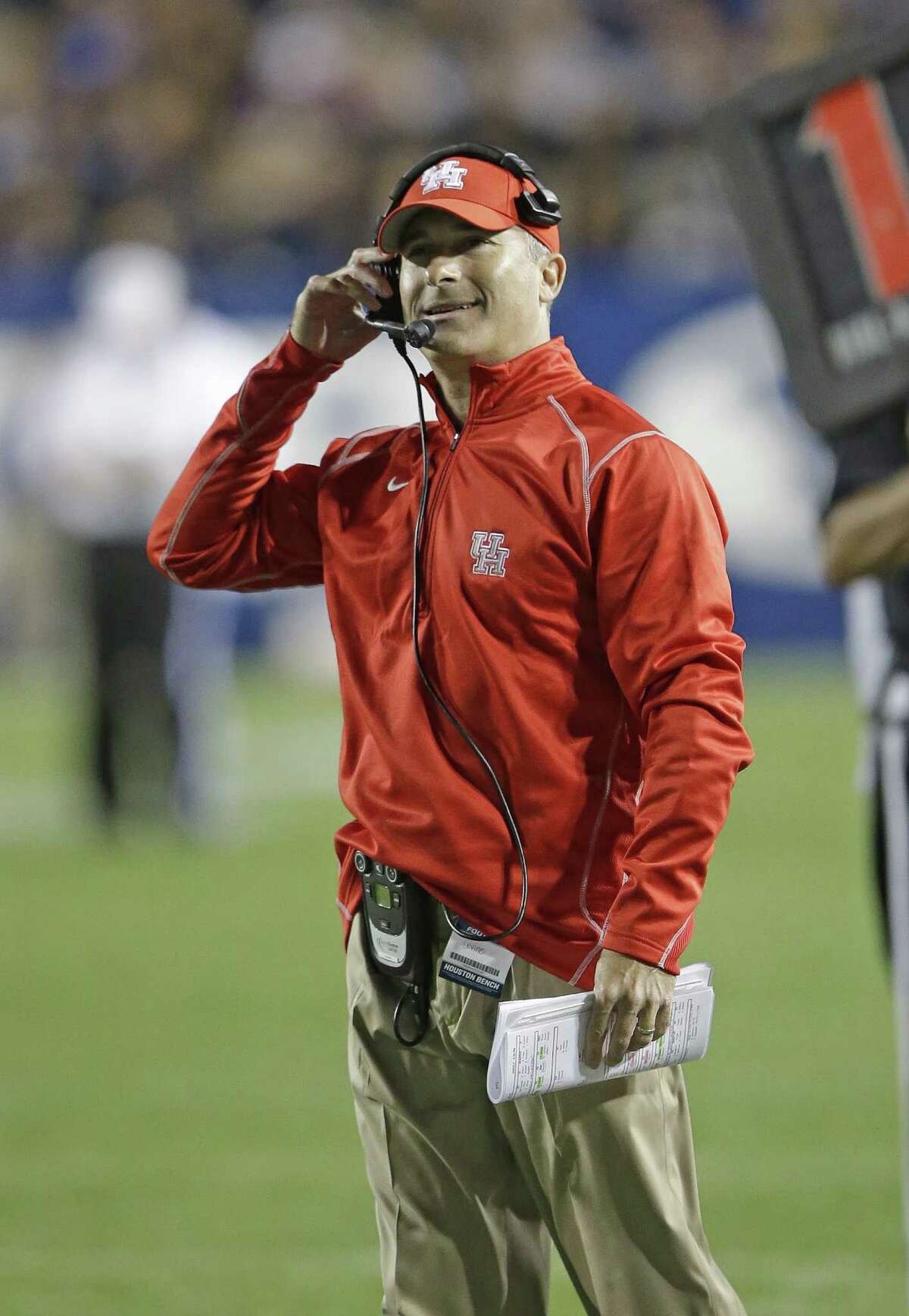 Houston head coach Tony Levine looks on in the second quarter during an NCAA college football game against BYU, Thursday, Sept. 11, 2014, in Provo, Utah.(AP Photo/Rick Bowmer)