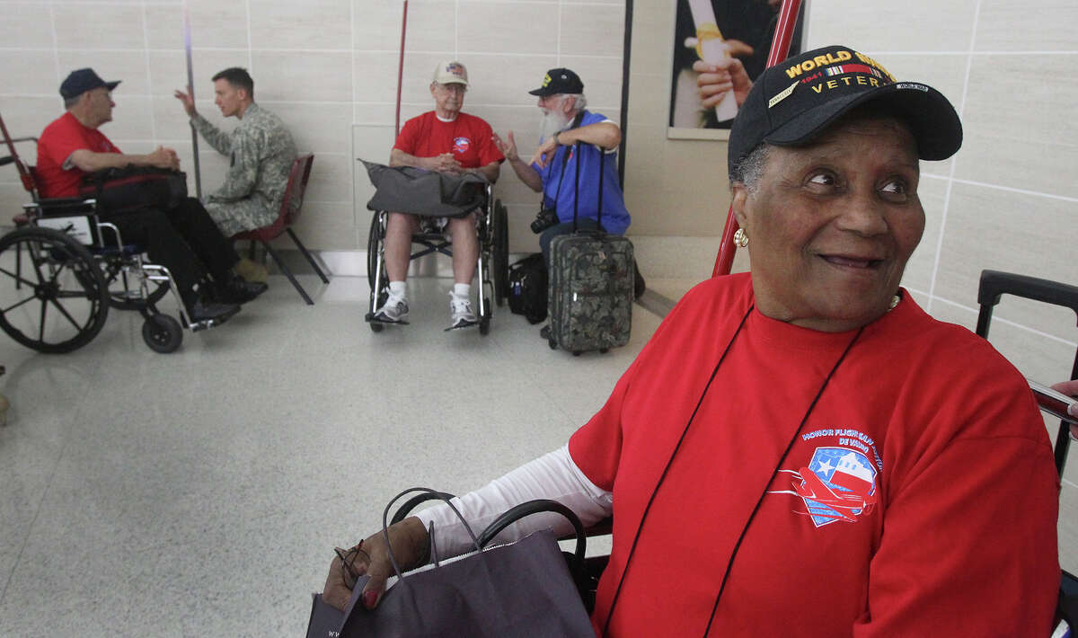World War II veteran Rose Witherspoon Spence,91, (right) prepares Friday September 12, 2014 to board a flight that will take her and other veterans to see the National World War II Memorial in Washington D.C. . Spence and other veterans went on the trip arranged by Honor Flight San Antonio de Valero.