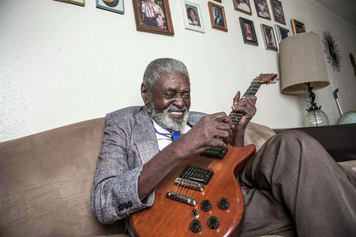 Jimmy Dotson, a Houston blues musician, poses for a portrait with his guitar in his home Friday September 12, 2014 in Houston, TX. (Michael Starghill, Jr.)