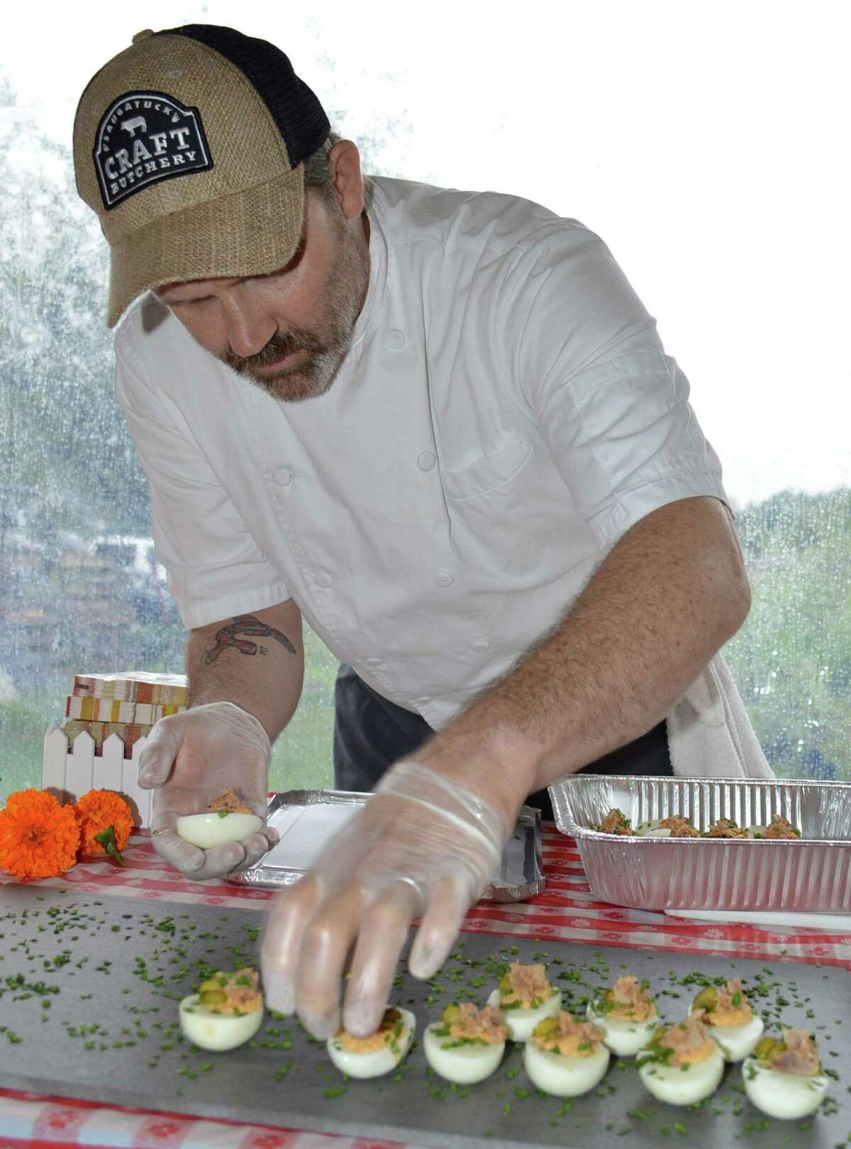 Mark Heppermann of the Saugatuck Craft Butchery prepares some appetizers for 225 guests at Harvest Fest.