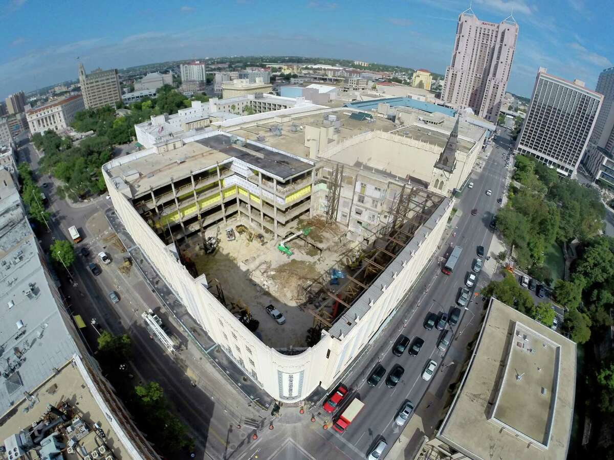 The former Joske's building at the corner of Alamo and Commerce is seen Monday Sept. 15, 2014 in an aerial image taken with a quadcopter. Construction crews on Monday completed demolishing the old, timber-frame structure of the historic Joske?•s building as part of the renovation of Rivercenter mall. Part of the demolition included removing the roof of the former department store, at the corner of Alamo and Commerce streets, so crews can begin building 75-foot concrete piers to support the new structure, which soon will house a multi-level H&M store among other tenants.