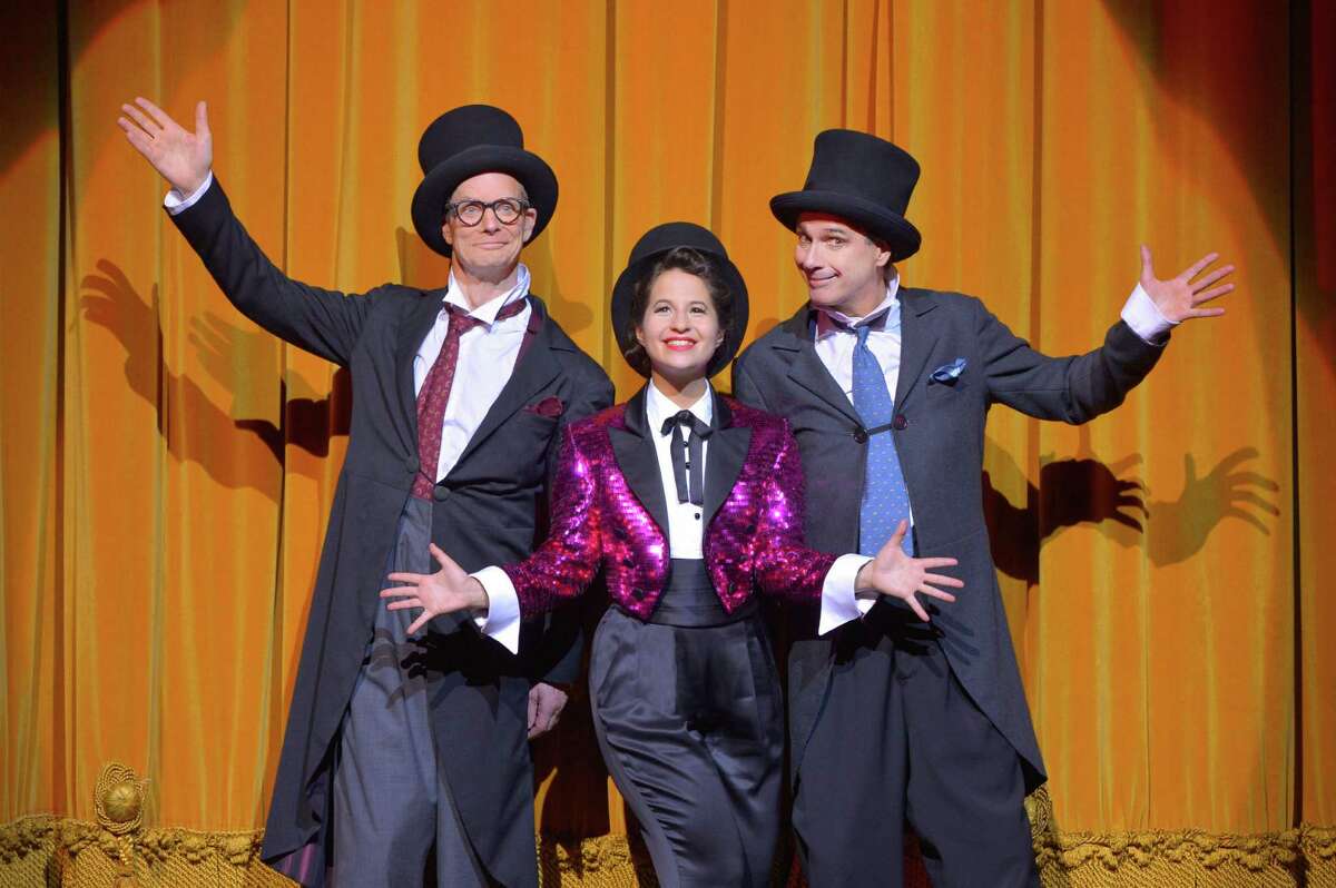 Bill Irwin, left, and David Shiner (right) with singer/songwriter co-performer Shaina Taub in "Old Hats" at ACT