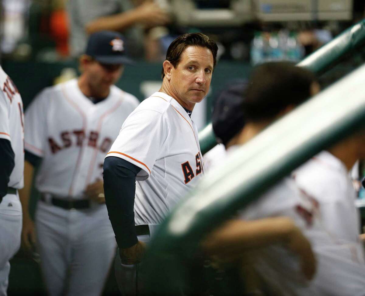Triple A Oklahoma City Manager Tony DeFrancesco in the dugout in the sixth inning of an MLB baseball game at Minute Maid Park, Monday, Sept. 15, 2014, in Houston.