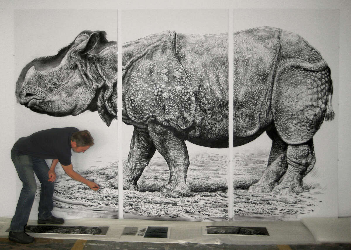 Larger-Than-Life Charcoal Portraits