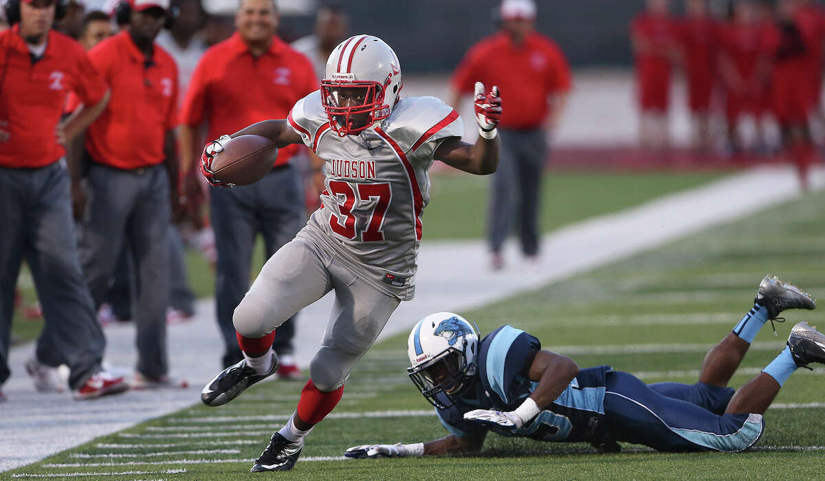 Rocket running back Mi'Kel Jackson shakes a defender and opens up the field in the second quarter as Judson hosts Johnson at Rutledge Stadium on September 11, 2014.