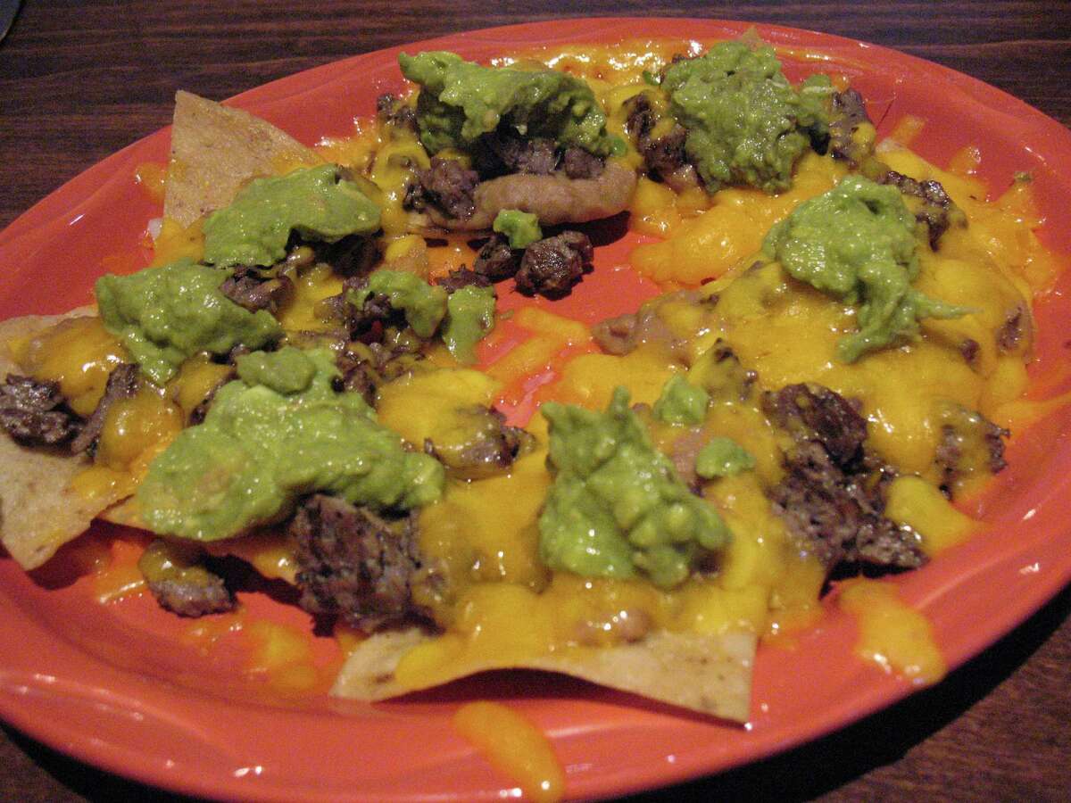 Super nachos: But none of that weak sauce like you would find at Taco Bell. This must be full on nachos with loads of melted cheese with gobs of gauc, jalapenos and no ground beef. Steak or chicken only.