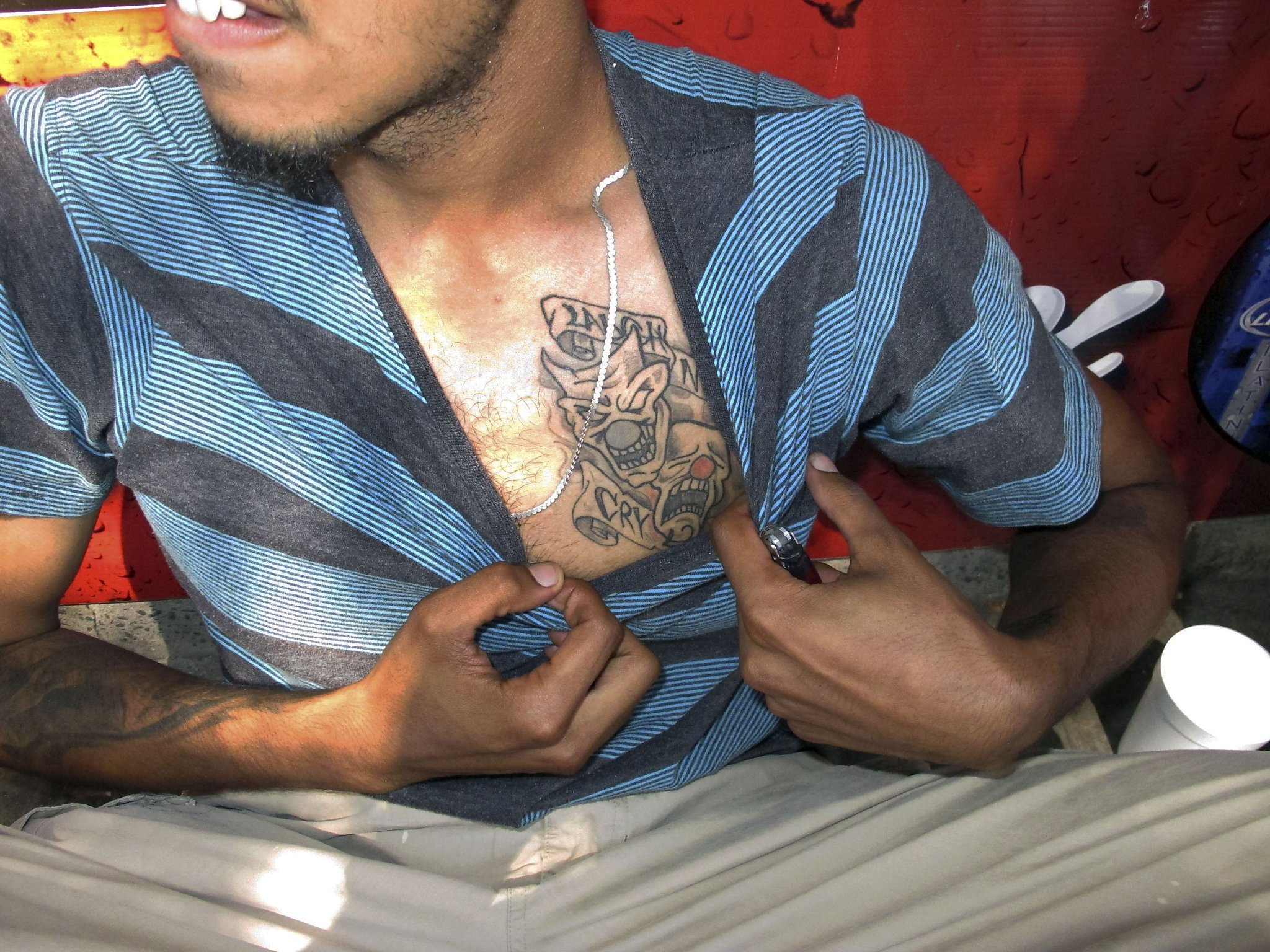 Street gangs tone down use of colors, tattoos to lower profile