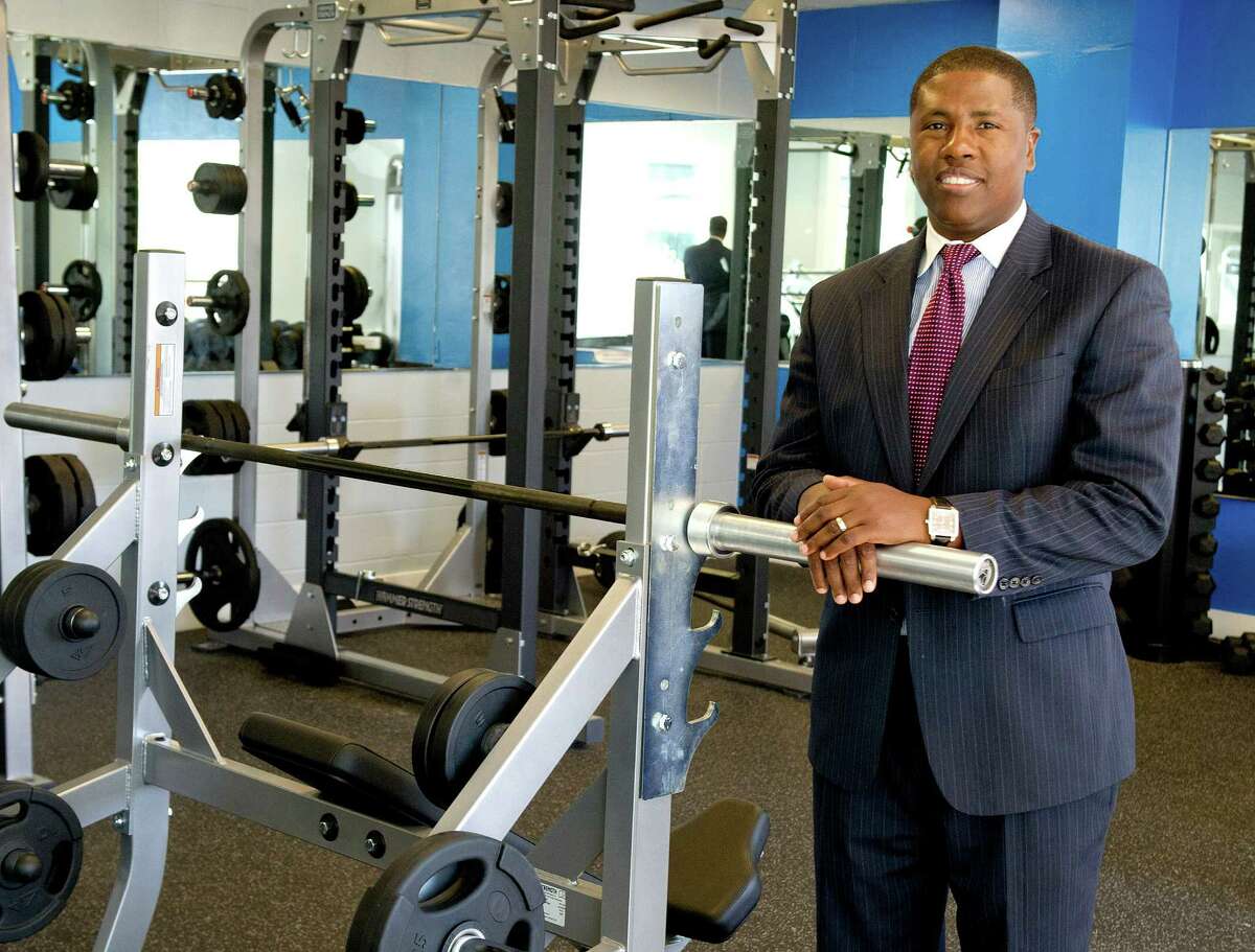 Ernest Lamour, CEO of Stamford YMCA, poses for a photo in the newly renovated weight room on Wednesday, September 17, 2014.