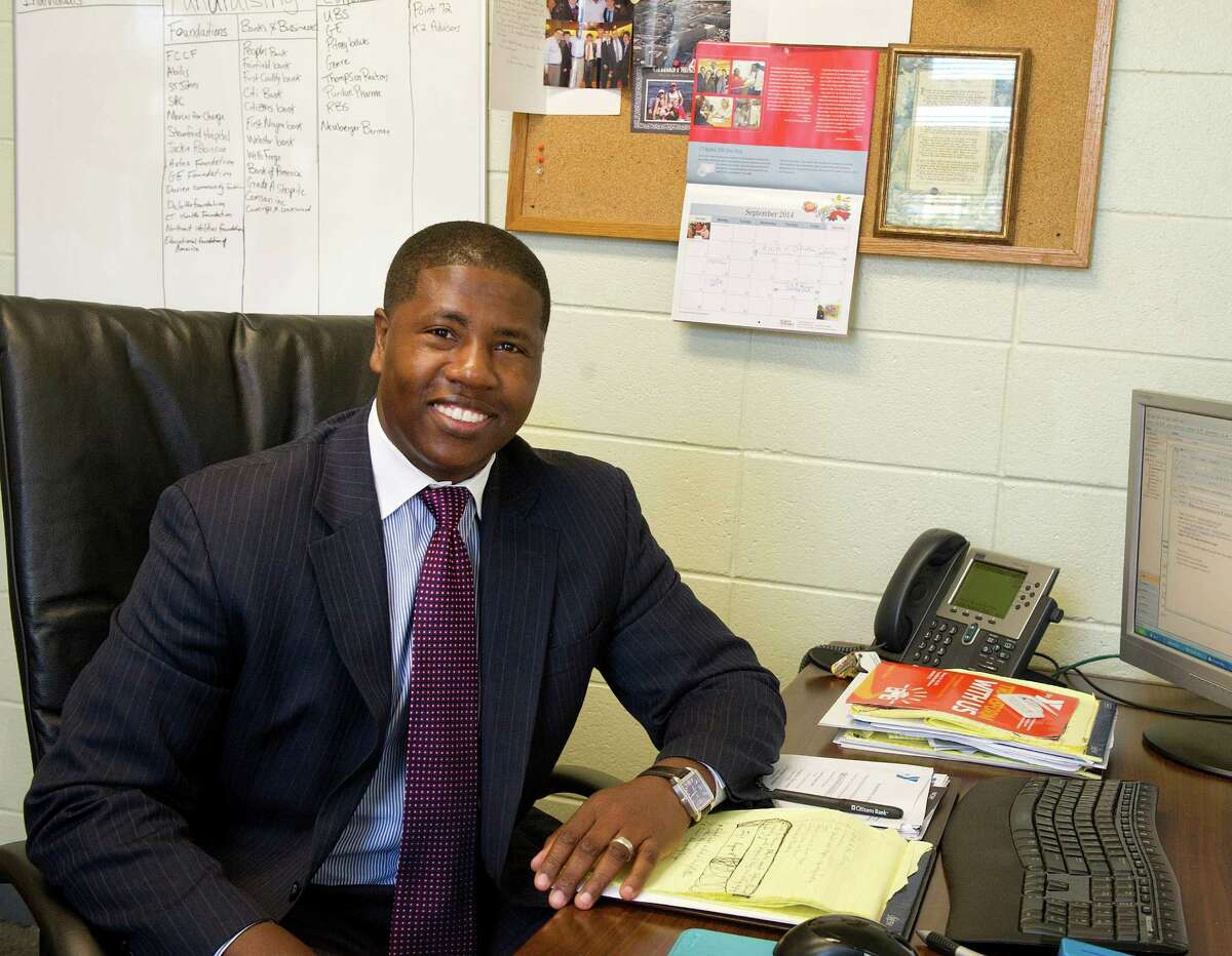 Ernest Lamour, CEO of Stamford YMCA, poses for a photo in his office on Wednesday, September 17, 2014.