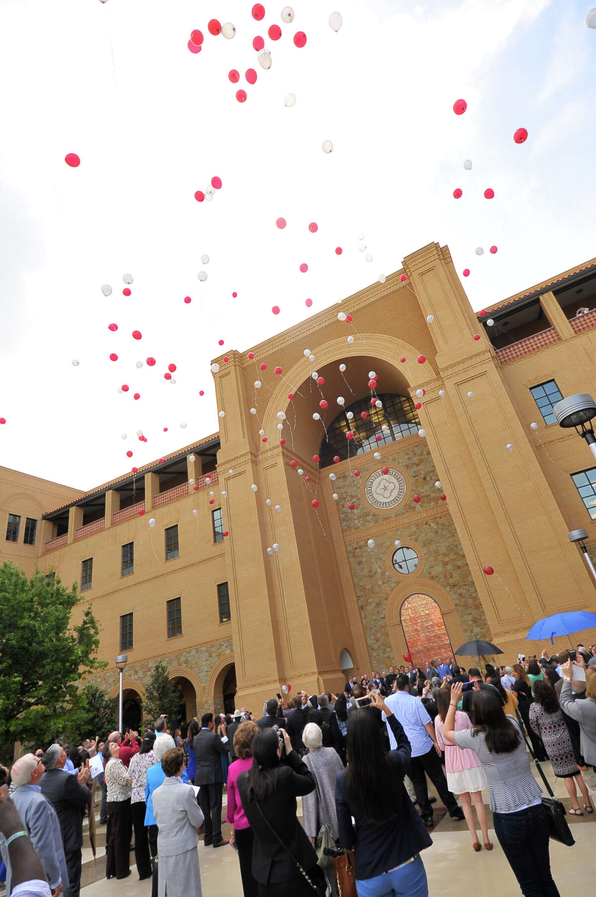 Balloons rise into the sky during the debut ceremonies for the new central academic center at Texas A&M University-San Antonio on Wednesday morning, Sept. 17, 2014.
