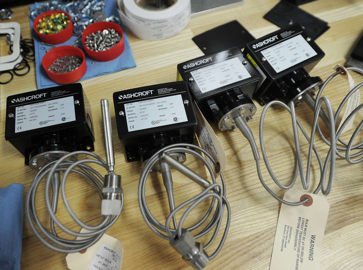 Newly assembled temperature switches at Ashcroft, Inc. in Stratford, Conn. on Thursday, September 18, 2014.