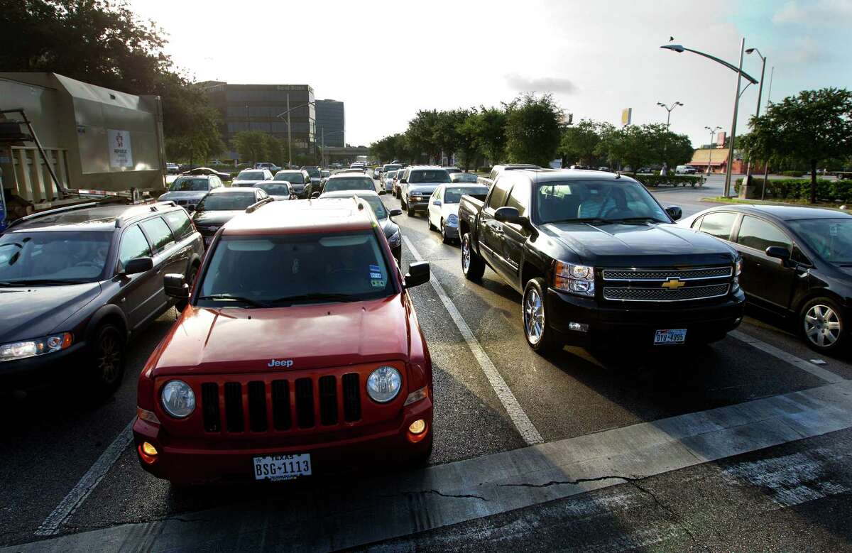 Traffic backs up along Post Oak in March 2014. (Cody Duty / Houston Chronicle)