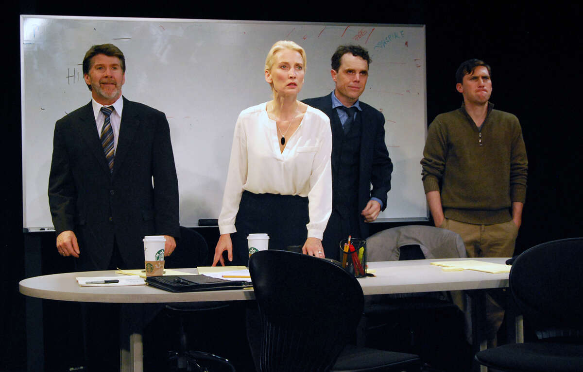 In Aaron Loeb's office comedy/psychological thriller, a corporate team consisting of (from left) Michael Ray Wisely, Carrie Paff, Mark Anderson Phillips and Ben Euphrat, gets some bad news about their enigmatic project. Photo by Jordan Puckett