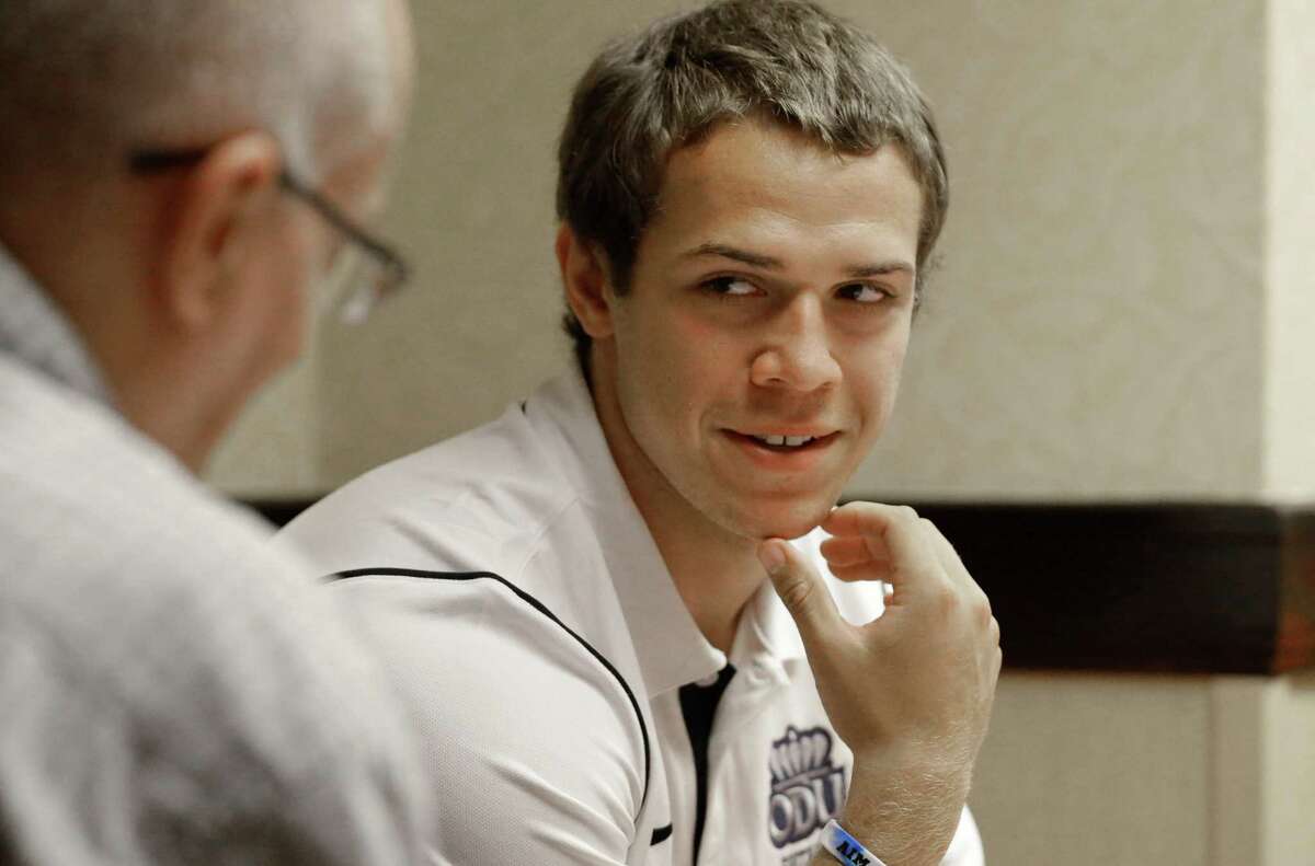 Old Dominion quarterback Taylor Heinicke listens to a reporters' question during the NCAA college Conference USA football media day in Irving, Texas Wednesday, July 23, 2014. (AP Photo)