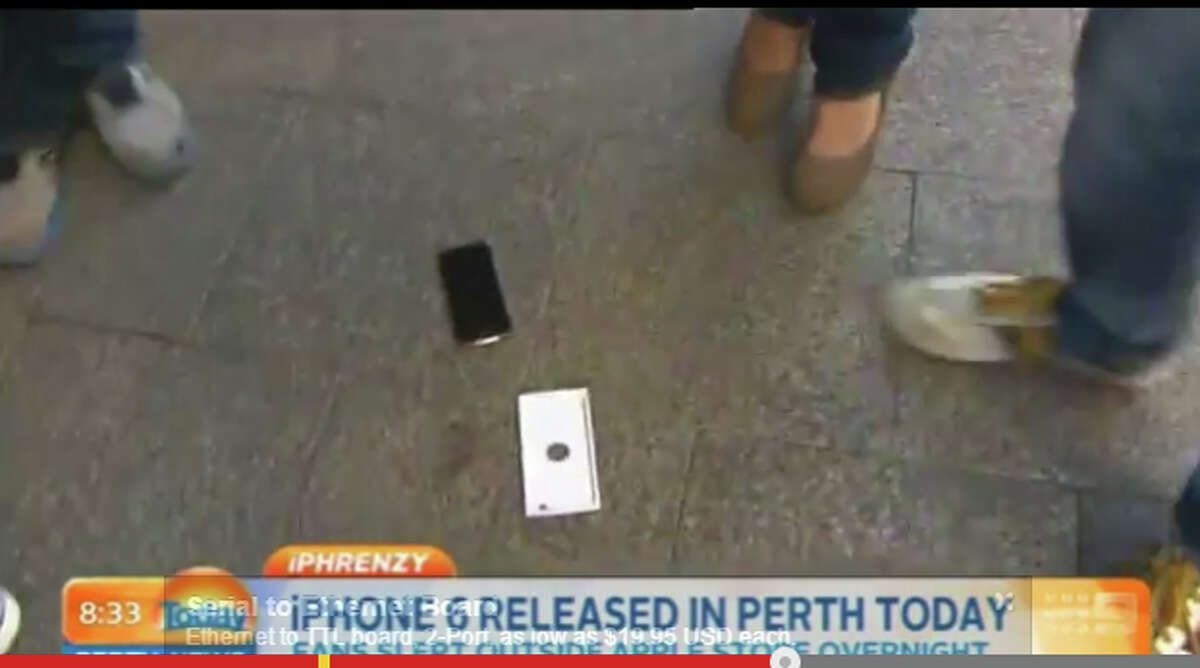 Guy drops new iPhone 6 on live TV, crowd gasps