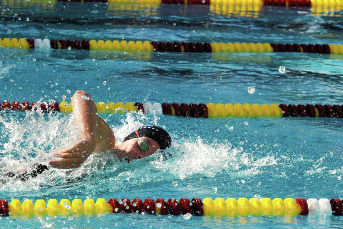Darien junior Lauren Rutledge swims during an away meet at Wilton on Wednesday, Sept. 17.