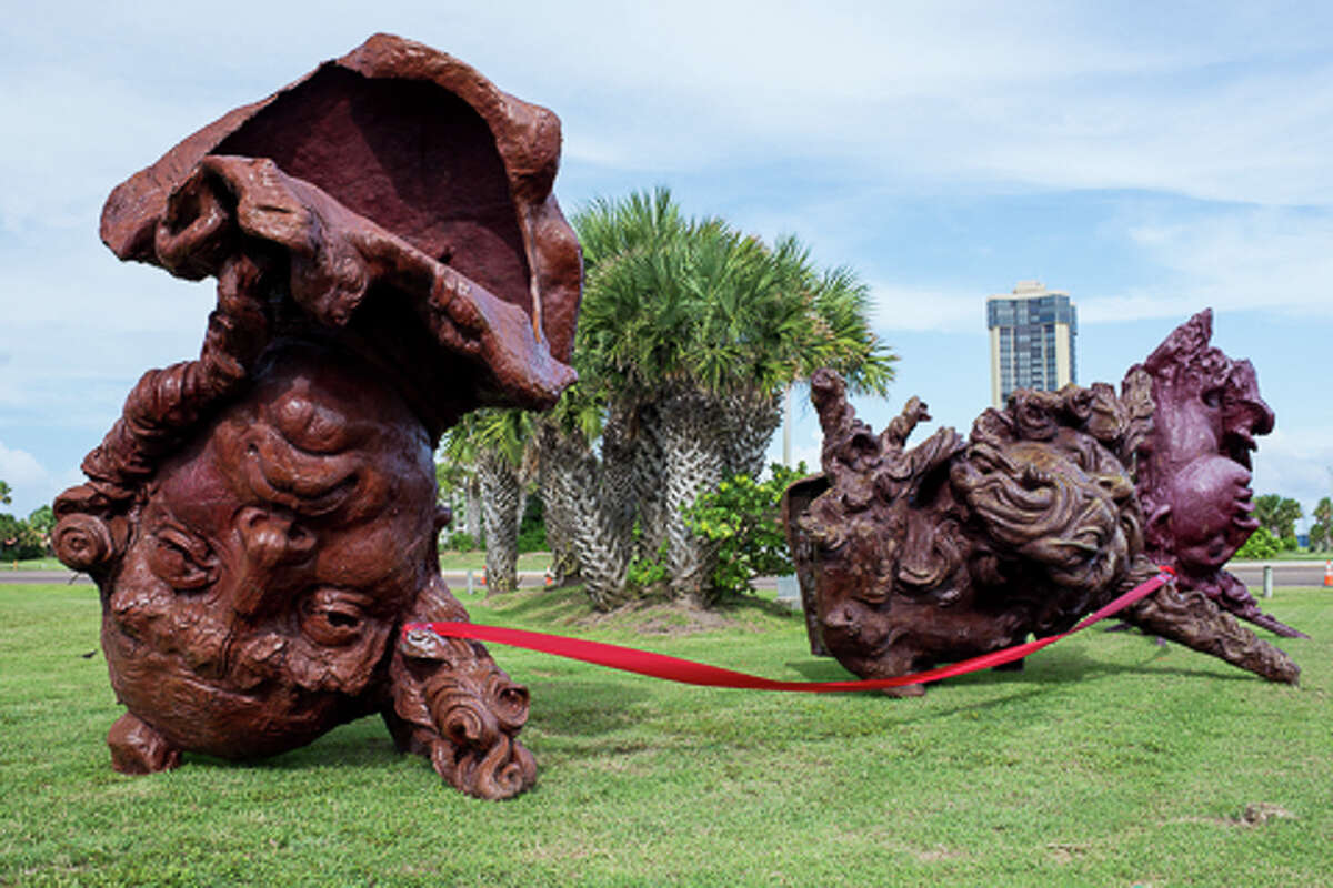 Giant head sculptures greet South Padre tourists