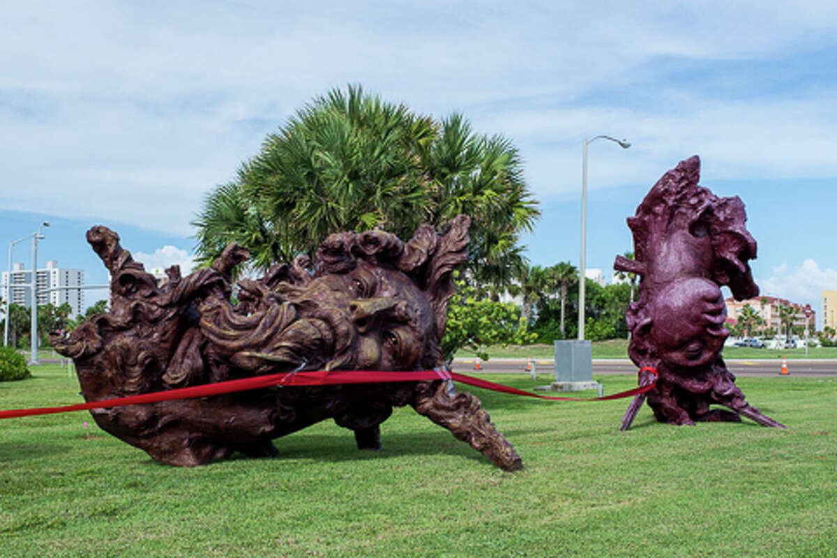 Giant head sculptures greet South Padre tourists
