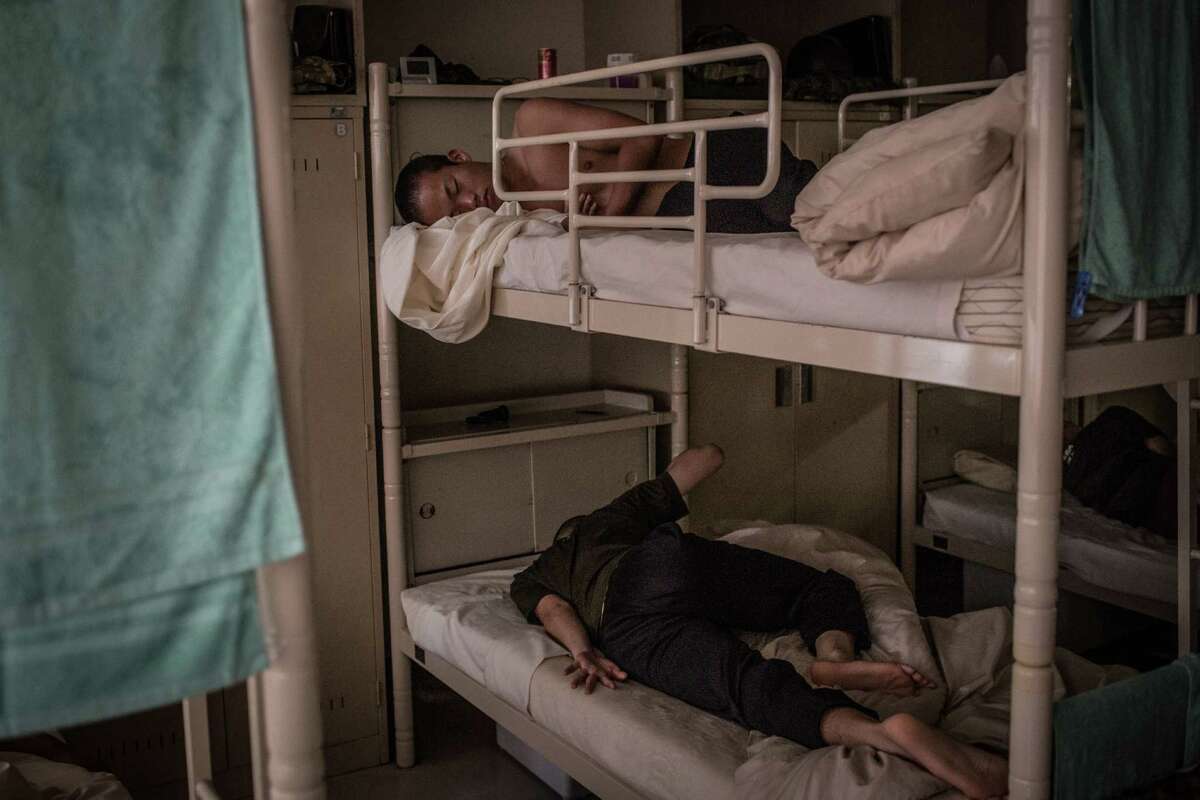 Students sleep in a dormitory at the Japan Ground Self-Defense Force (JGSDF) High Technical School on September 17, 2014 in Yokosuka, Japan.