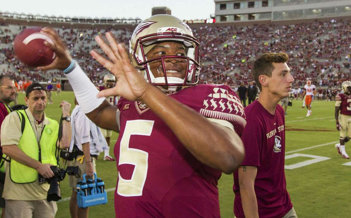 Florida State quarterback Jameis Winston, who was suspended for Saturday's game against Clemson, still dressed out and took part in warmups.