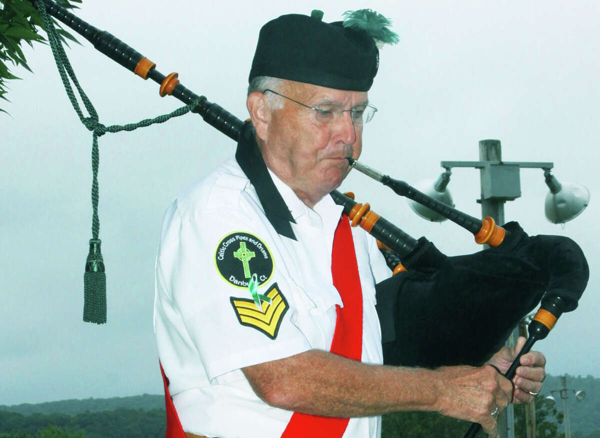 Pat Maguire graces New Milford's annual 9/11 memorial ceremony at Patriot's Way with bagpipe skills, Sept. 11, 2014