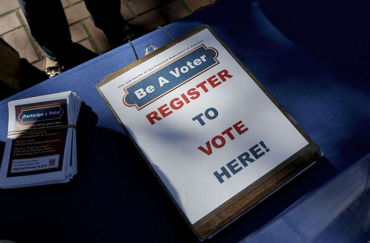 A display is set up in United Nations Plaza urging people to register to vote, as seen on Tuesday Sept. 23, 2014, in San Francisco, Calif. The San Francisco Department of Elections holds a voter registration drive at UN Plaza during today's National Voter Registration Day.