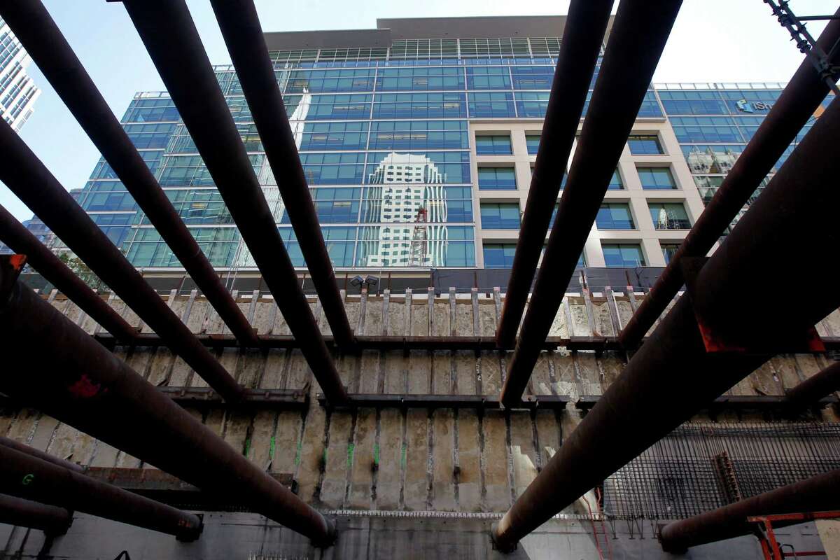 Construction continues on the Transbay Transit Center in San Francisco, even as a legal fight brews over how much in taxes developers should pay on their projects near the facility.