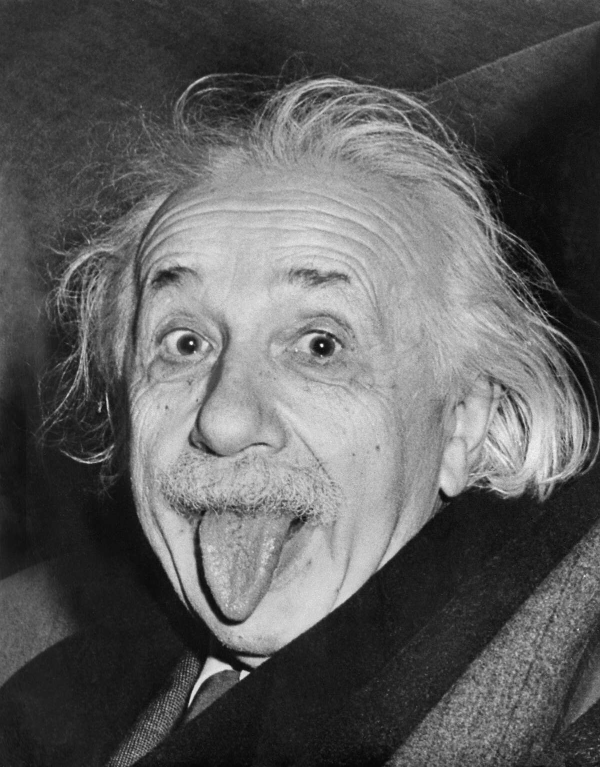 Celebrated picture dated 18 march 1951, shows German-born Swiss-US physicist Albert Einstein (1879-1955), awarded the Nobel Prize for Physics in 1921, sticking out his tongue at photographers on his 72nd birthday. AFP ARTHUR SASSE