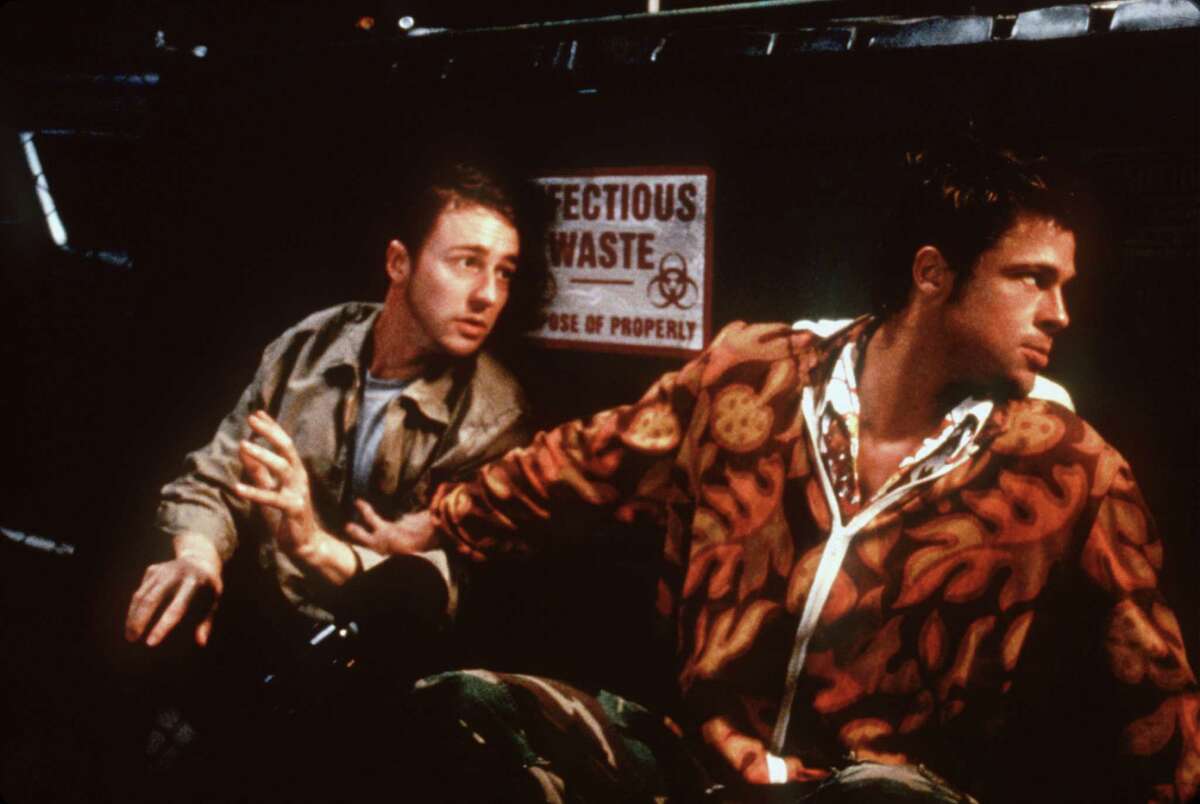 "FIGHT CLUB" -- (l-r) ED NORTON AND BRAD PITT. Edward Norton. HOUCHRON CAPTION (10/15/1999): Fists fly and blood spatters when Brad Pitt, right, teams up with Edward Norton in "Fight Club."
