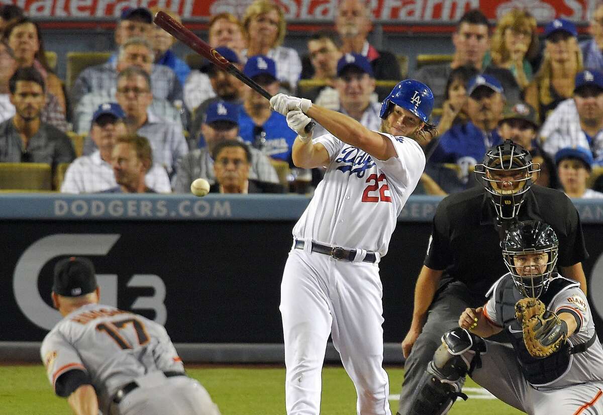 Dodgers, Kershaw beat Giants to clinch NL West title